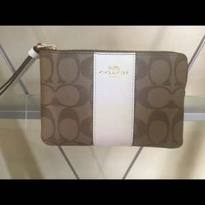 Brand new COACH wristlet (Authentic)
